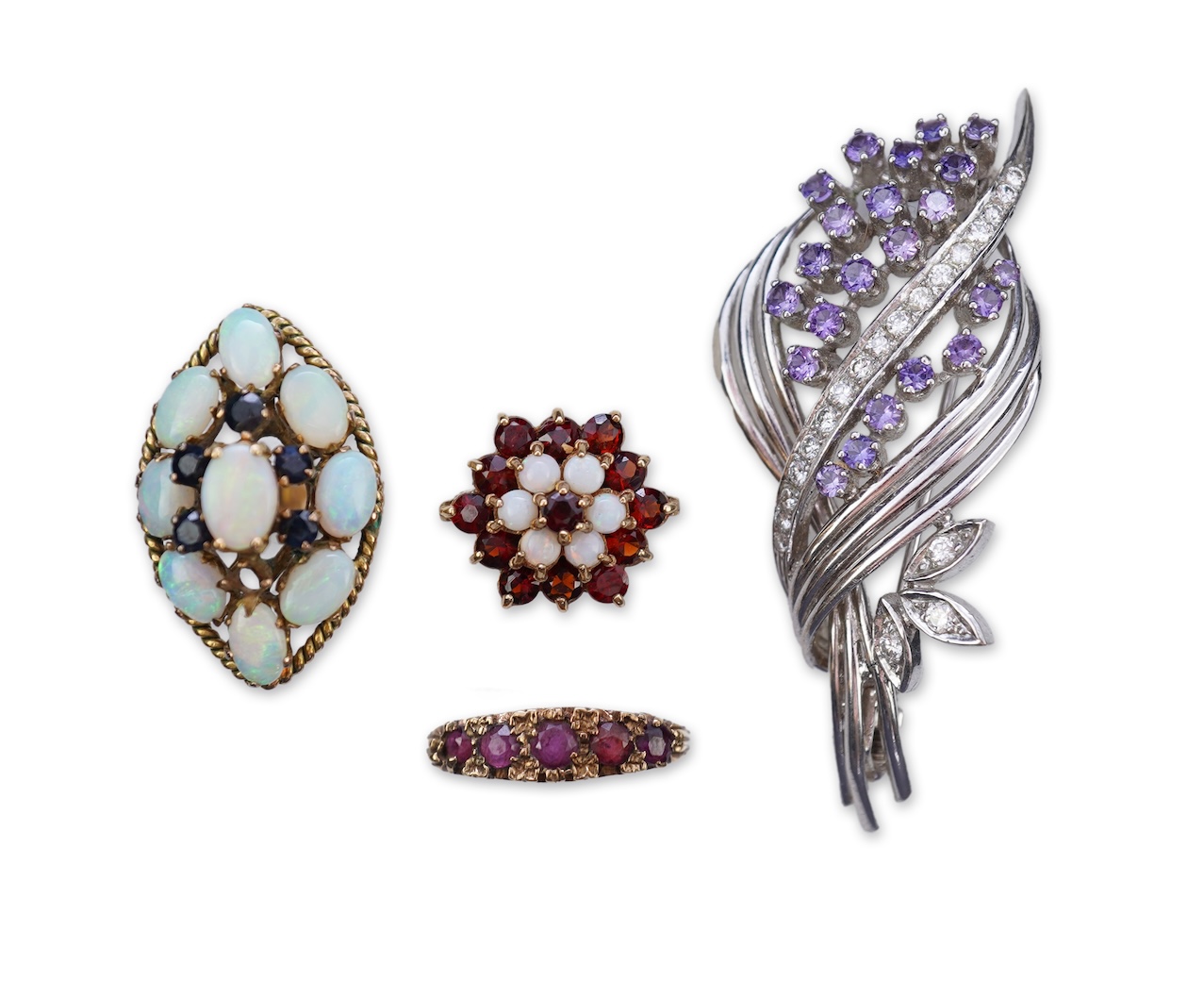 Three rings and a brooch